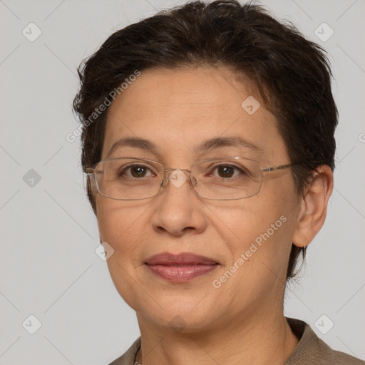 Joyful white adult female with short  brown hair and brown eyes