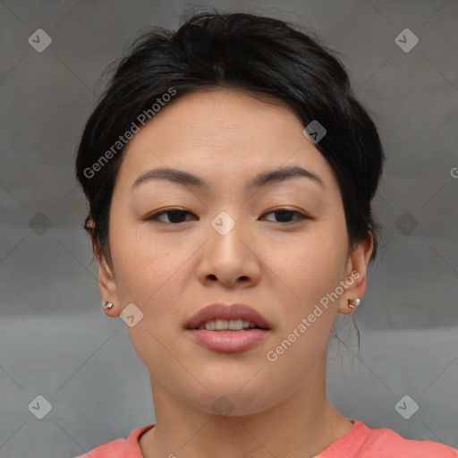 Joyful asian young-adult female with short  brown hair and brown eyes