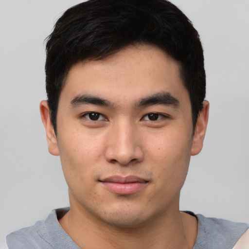 Neutral asian young-adult male with short  brown hair and brown eyes