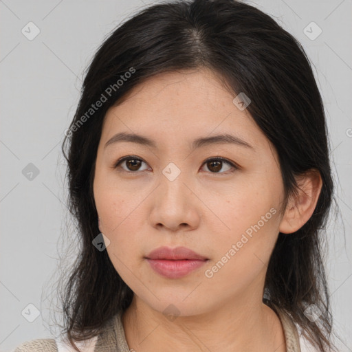 Neutral asian young-adult female with medium  brown hair and brown eyes