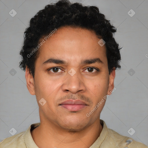 Joyful latino young-adult male with short  brown hair and brown eyes