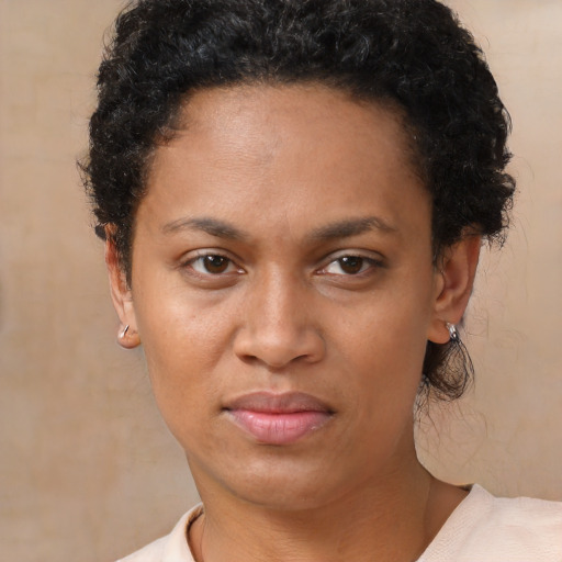 Neutral black adult female with short  brown hair and brown eyes