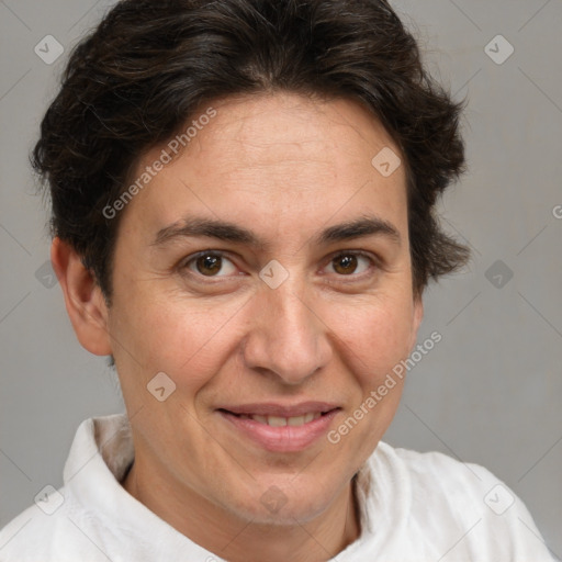 Joyful white adult female with short  brown hair and brown eyes