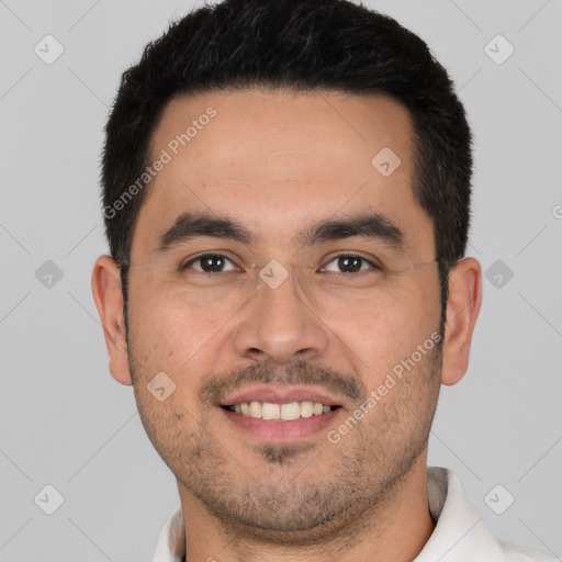 Joyful white young-adult male with short  black hair and brown eyes