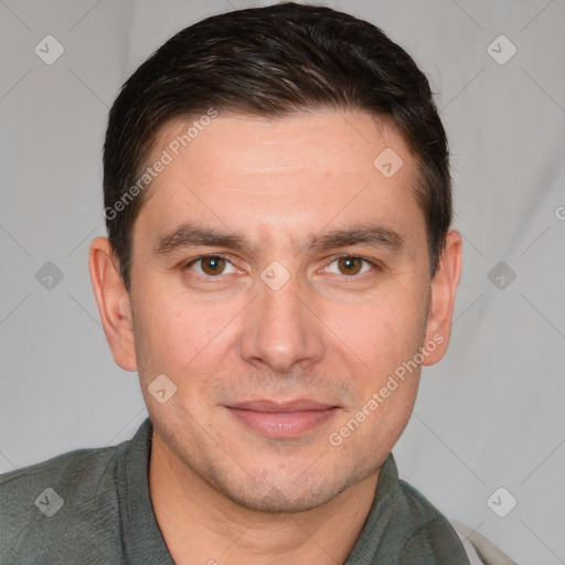 Joyful white adult male with short  brown hair and brown eyes