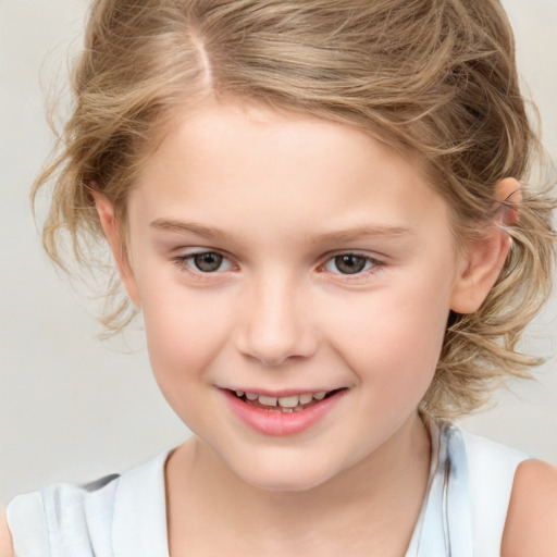 Joyful white child female with medium  brown hair and brown eyes