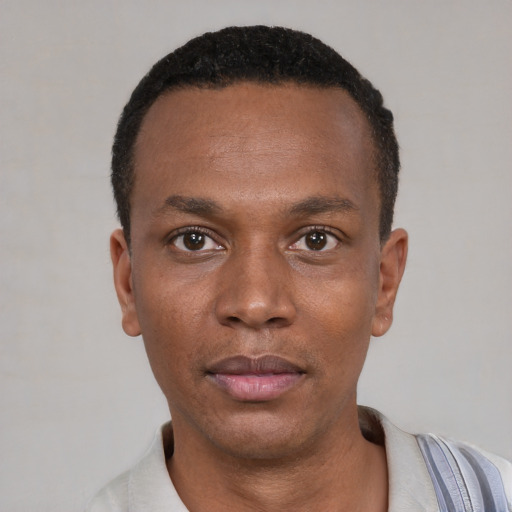 Neutral black young-adult male with short  black hair and brown eyes