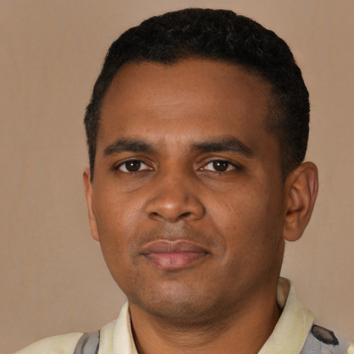Neutral black young-adult male with short  black hair and brown eyes