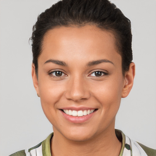 Joyful white young-adult female with short  brown hair and brown eyes