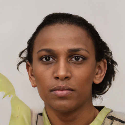 Neutral black young-adult female with short  brown hair and brown eyes