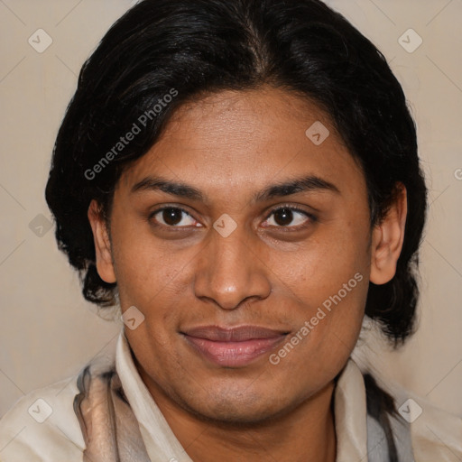 Joyful latino adult female with medium  brown hair and brown eyes