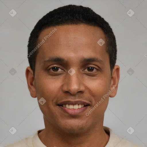 Joyful latino young-adult male with short  black hair and brown eyes