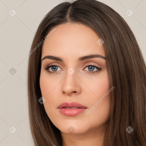 Neutral white young-adult female with long  brown hair and brown eyes