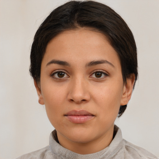 Neutral white young-adult female with short  brown hair and brown eyes