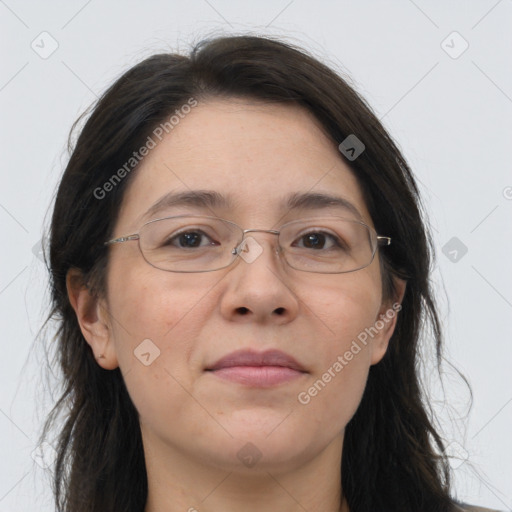 Joyful white adult female with long  brown hair and brown eyes