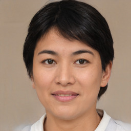 Joyful white young-adult female with medium  brown hair and brown eyes