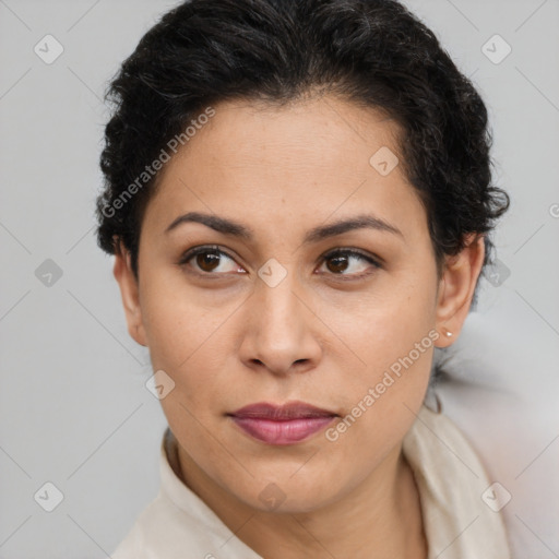 Joyful latino young-adult female with short  brown hair and brown eyes