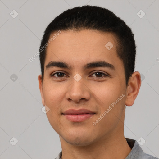 Joyful white young-adult male with short  black hair and brown eyes