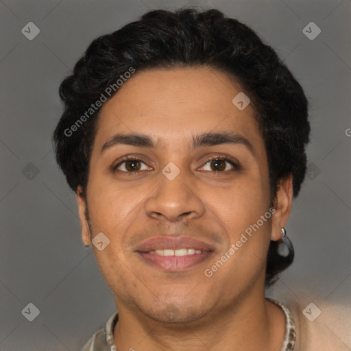 Joyful latino young-adult male with short  brown hair and brown eyes