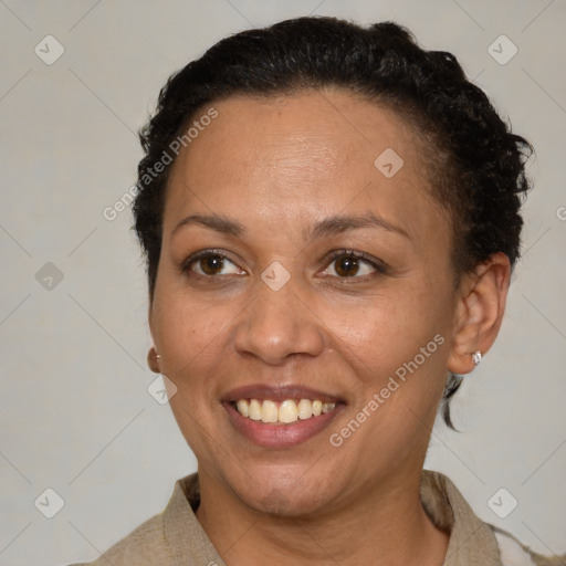 Joyful white adult female with short  brown hair and brown eyes