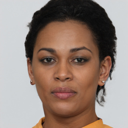 Neutral black young-adult female with short  brown hair and brown eyes