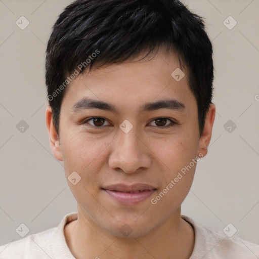 Joyful asian young-adult male with short  black hair and brown eyes