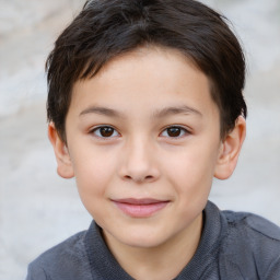 Joyful white child female with short  brown hair and brown eyes