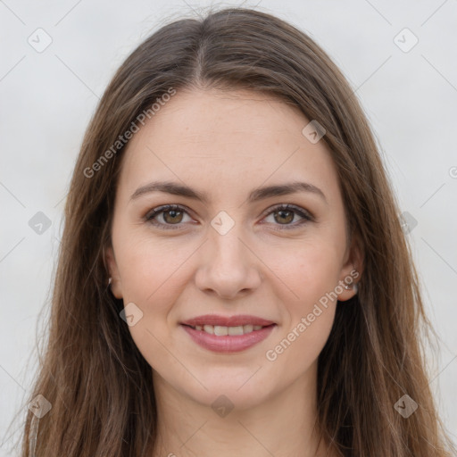 Joyful white young-adult female with long  brown hair and grey eyes