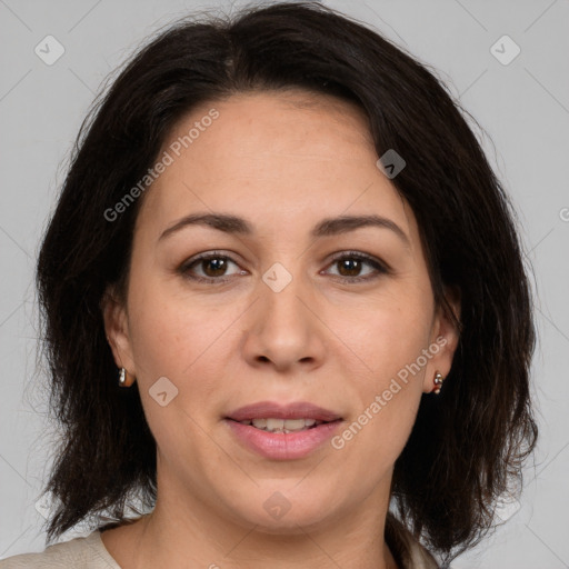 Joyful white adult female with medium  brown hair and brown eyes