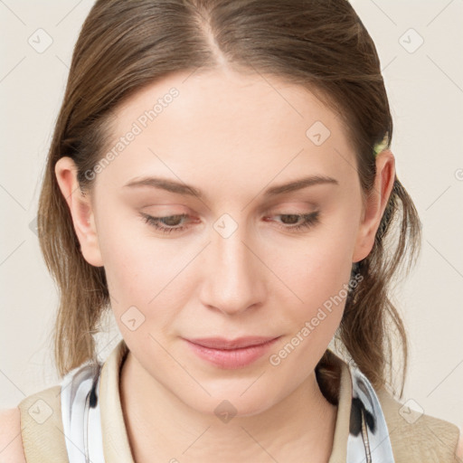 Joyful white young-adult female with medium  brown hair and blue eyes