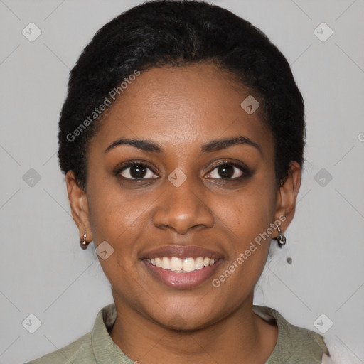 Joyful black young-adult female with short  black hair and brown eyes