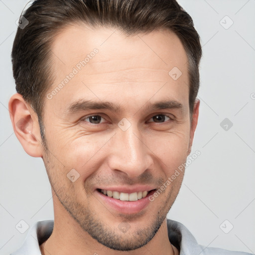 Joyful white young-adult male with short  brown hair and brown eyes