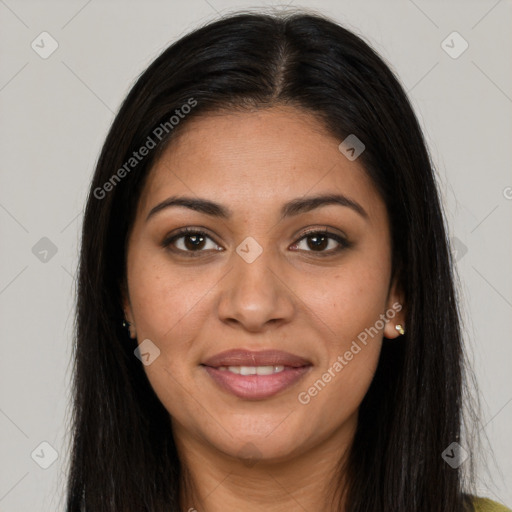 Joyful latino young-adult female with long  brown hair and brown eyes