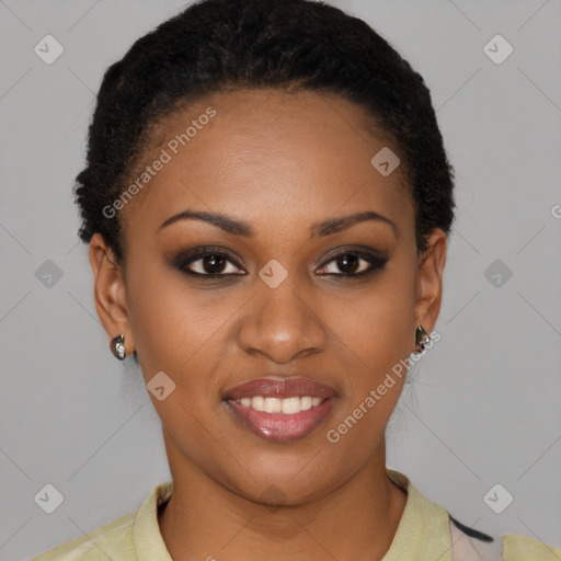 Joyful black young-adult female with short  black hair and brown eyes