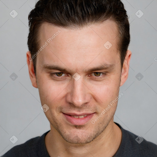 Joyful white adult male with short  brown hair and brown eyes