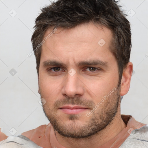 Neutral white adult male with short  brown hair and brown eyes