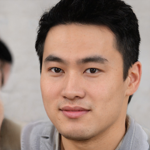 Neutral asian young-adult male with short  black hair and brown eyes
