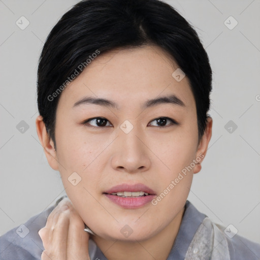 Joyful asian young-adult female with short  black hair and brown eyes