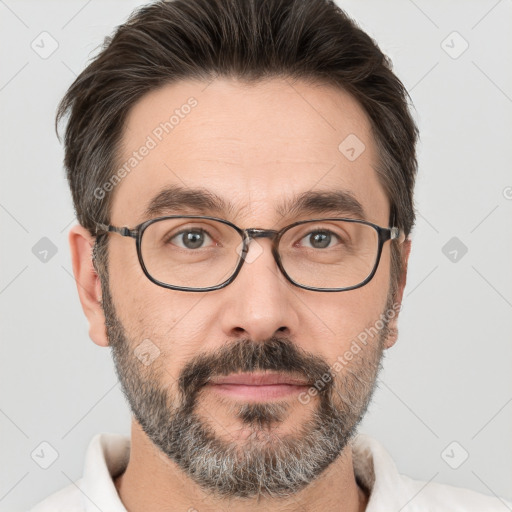 Neutral white adult male with short  brown hair and brown eyes