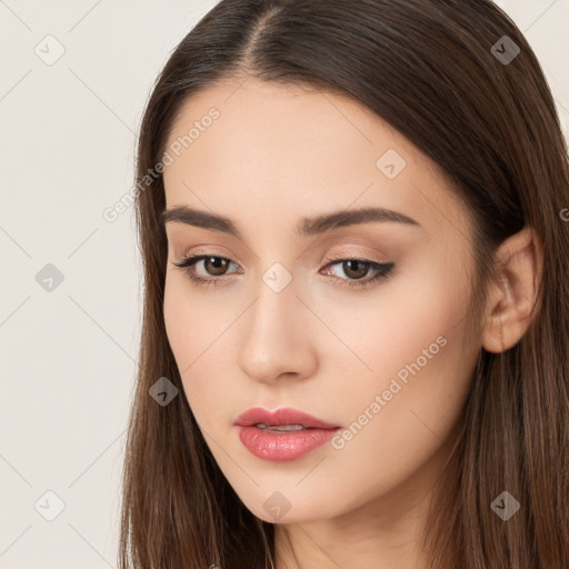 Neutral white young-adult female with long  brown hair and brown eyes