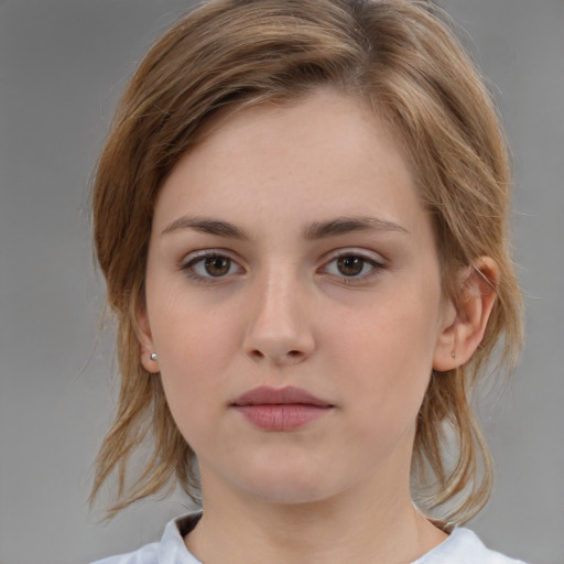 Neutral white young-adult female with medium  brown hair and brown eyes