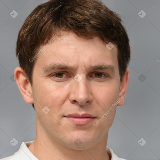 Joyful white adult male with short  brown hair and grey eyes