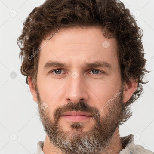 Neutral white adult male with short  brown hair and brown eyes