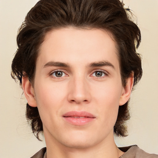 Neutral white young-adult male with medium  brown hair and brown eyes