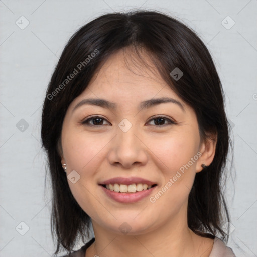 Joyful asian young-adult female with medium  brown hair and brown eyes