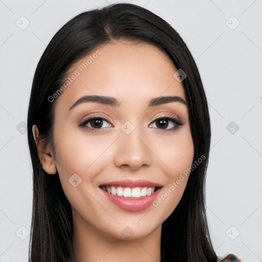 Joyful white young-adult female with long  black hair and brown eyes