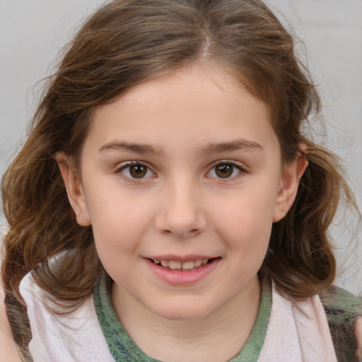 Joyful white child female with medium  brown hair and brown eyes