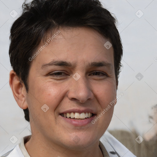 Joyful white adult male with short  brown hair and brown eyes