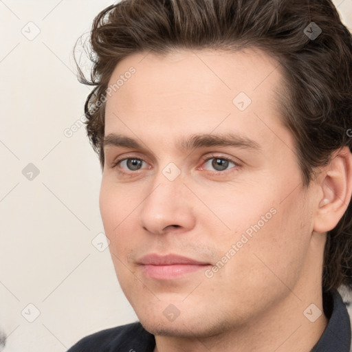 Neutral white young-adult male with short  brown hair and grey eyes