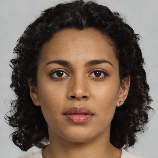 Neutral latino young-adult female with medium  black hair and brown eyes
